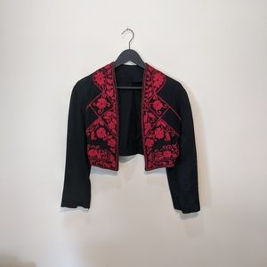 Handmade light crop jacket.